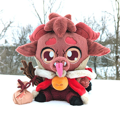 Sitting plush of Kidd Krampus. A soft brown goat-like creature with a lush holiday cloak and jingle bell necklace. Holding magnetic toy accessories.